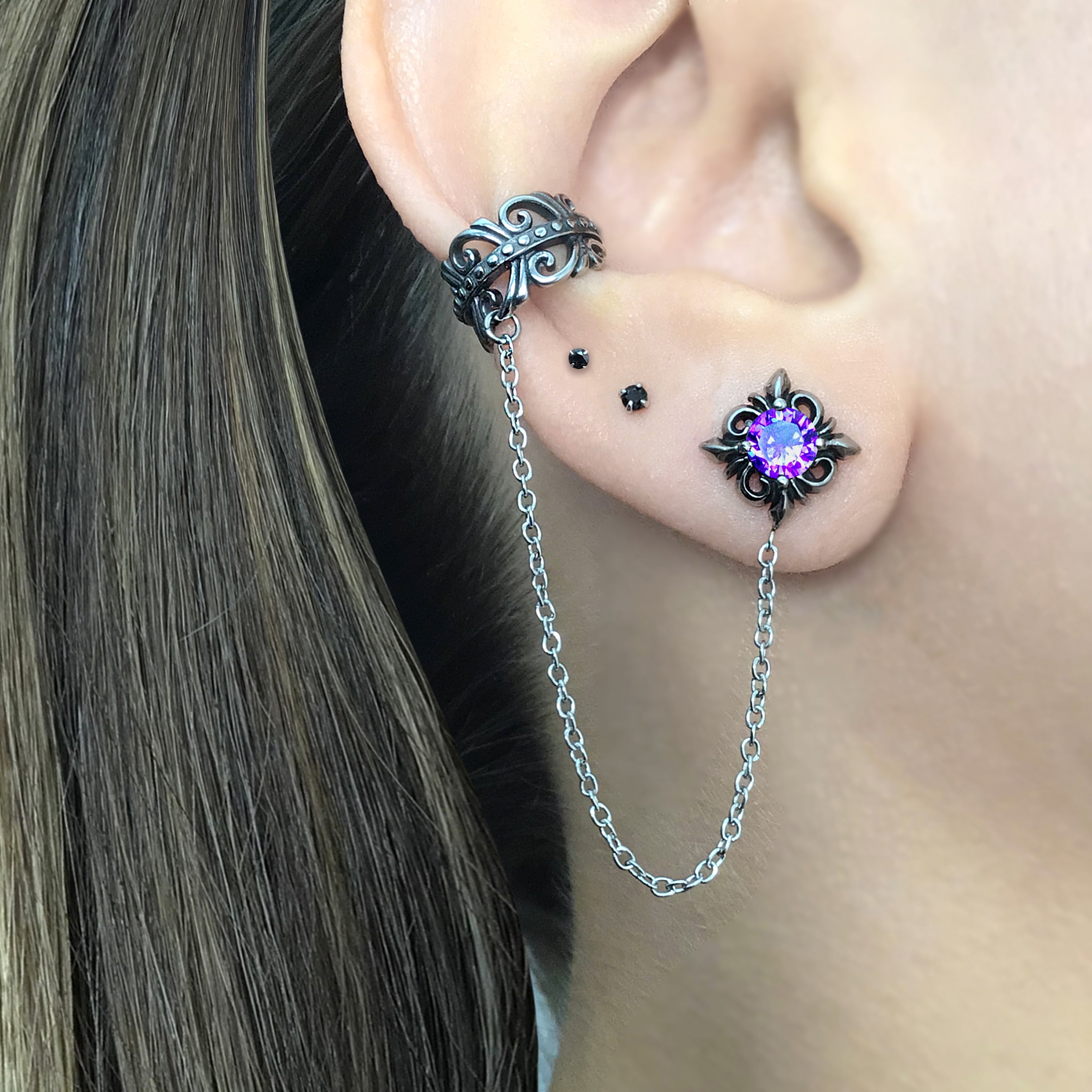 Stud earring with ear cuff attached