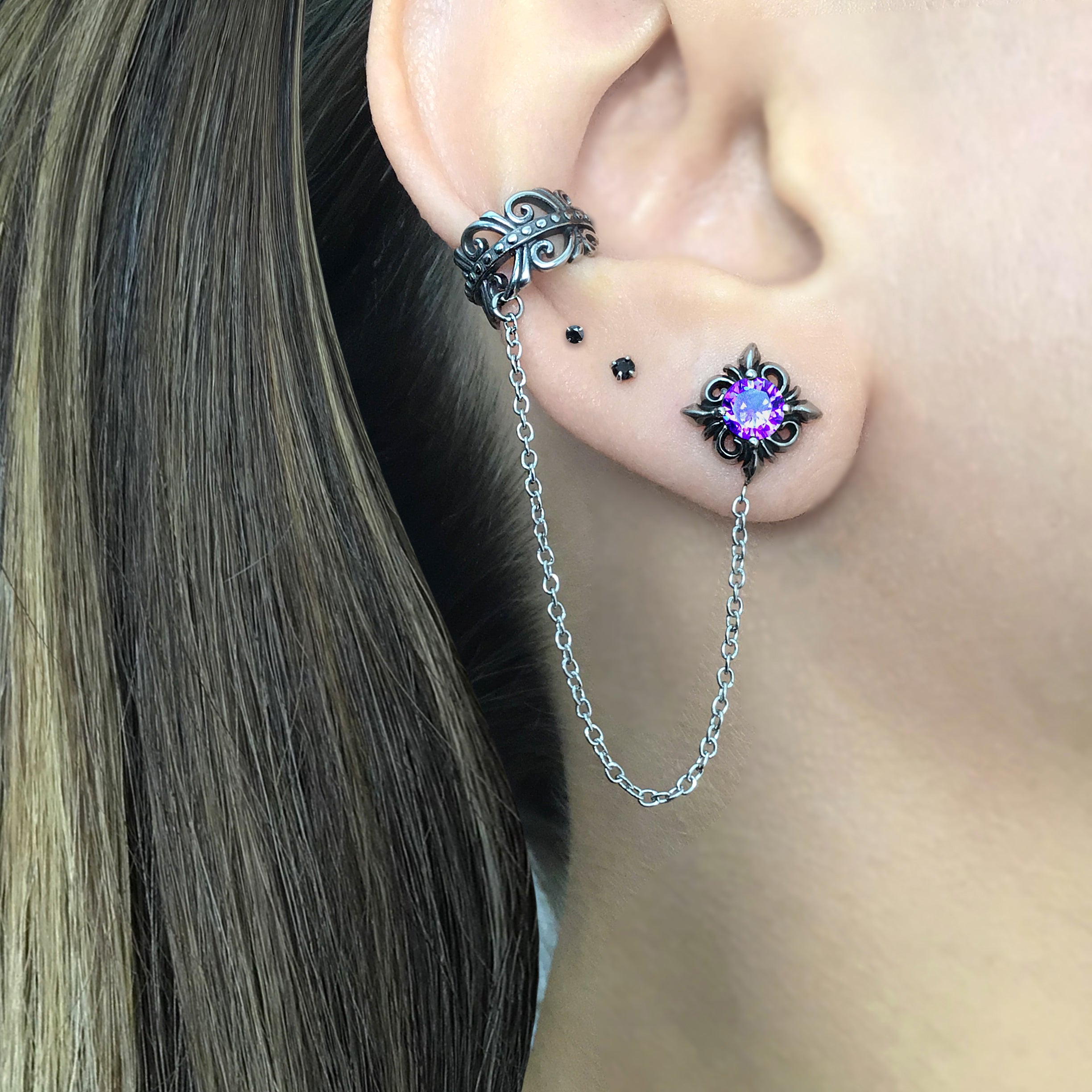 Stud earring with ear cuff attached