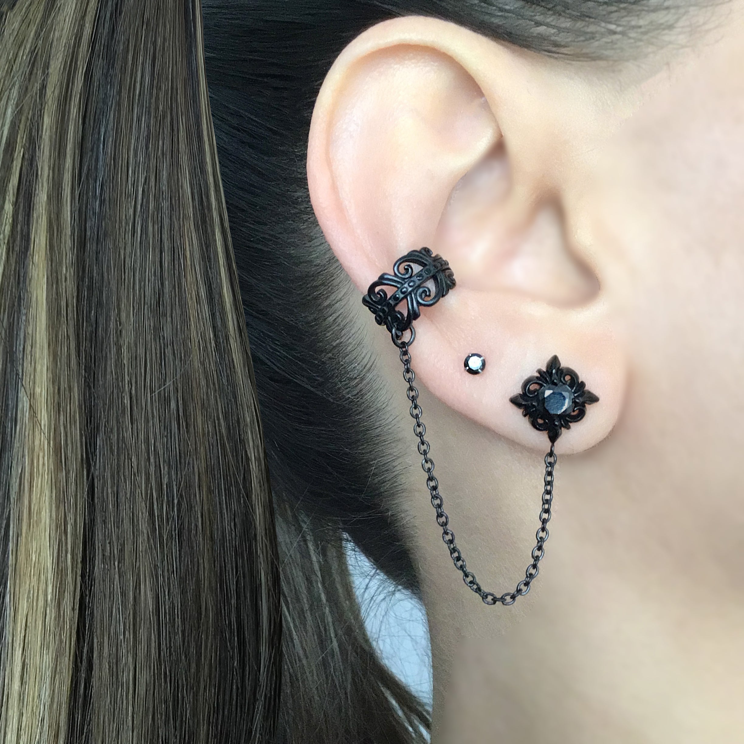 Stud earring with ear cuff attached