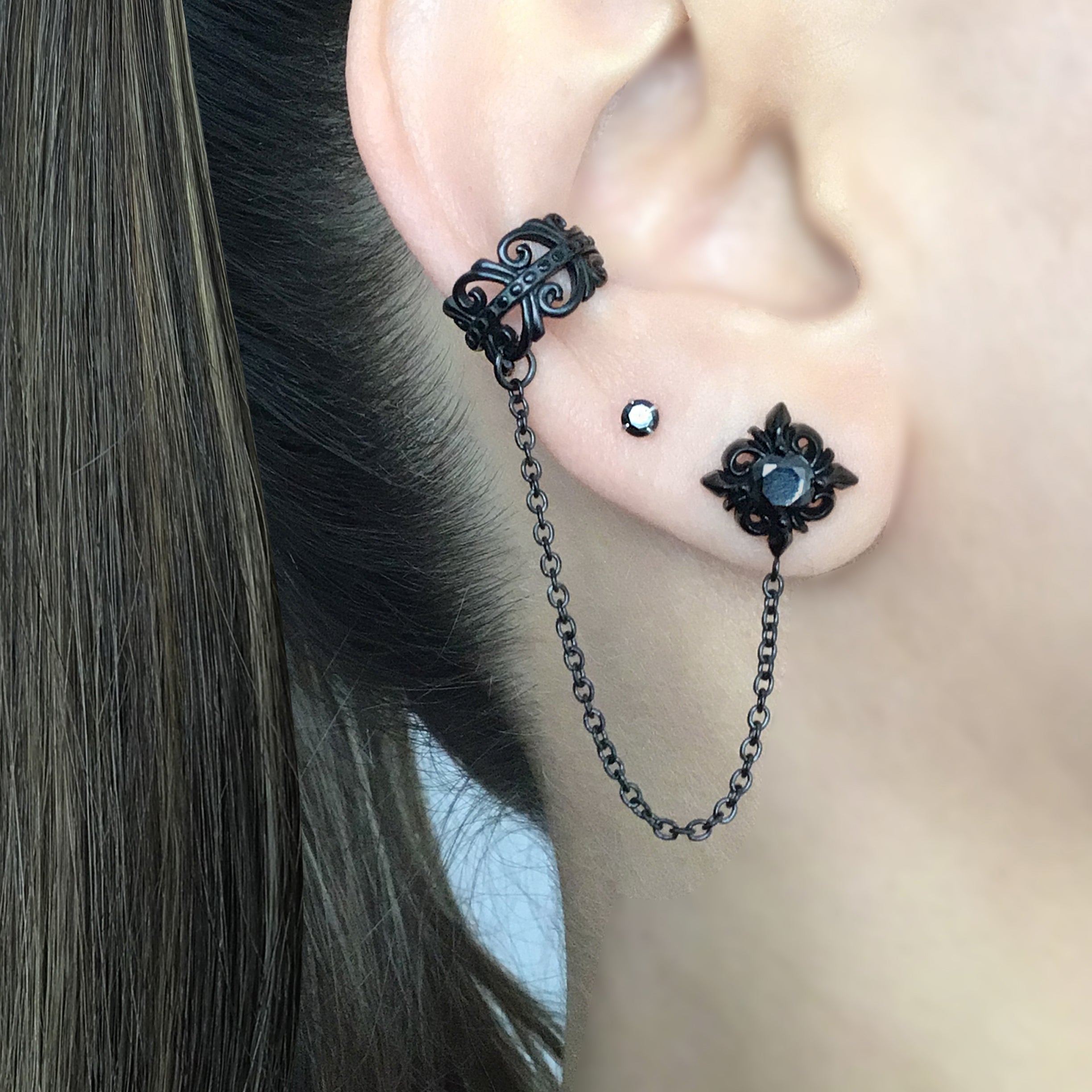 Stud earring with ear cuff attached