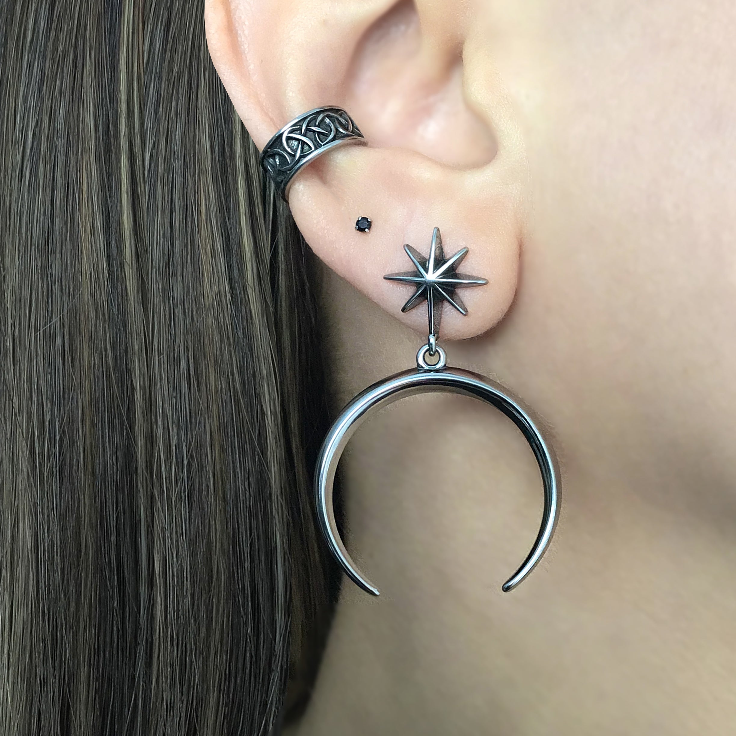 Star and moon stud earrings in Black