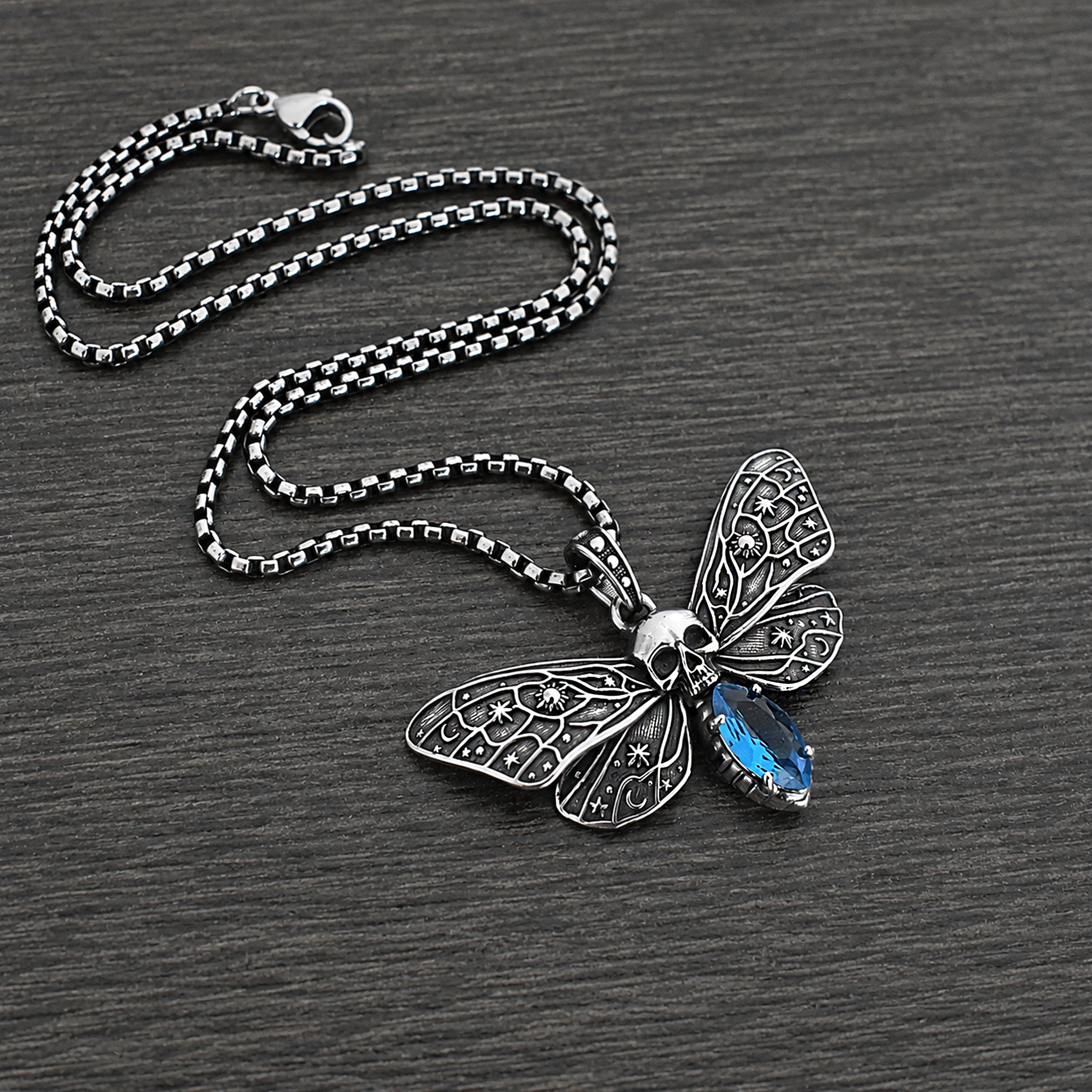 Cosmic Skull Moth Necklace with Blue stone