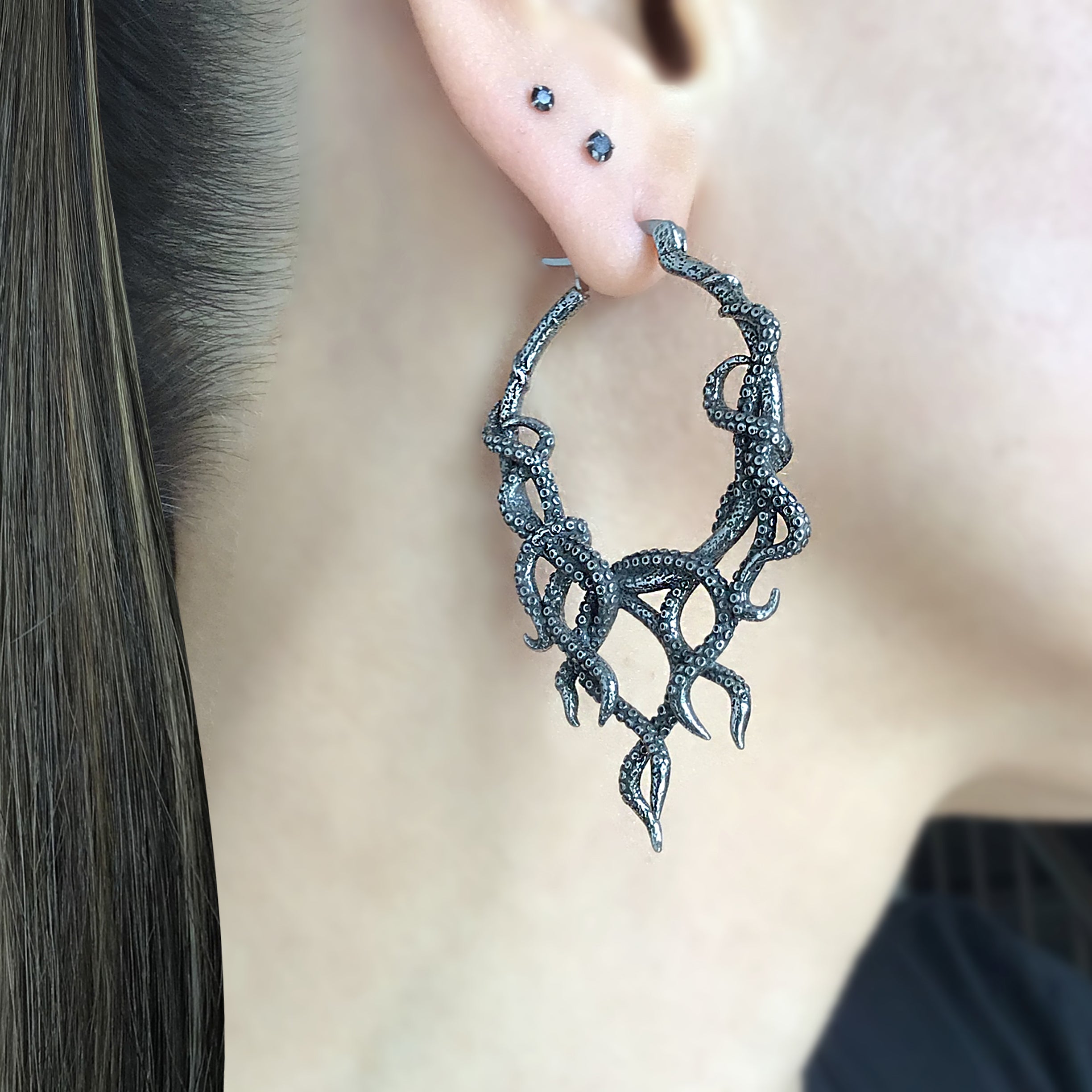 Octopus hoop earrings in Silver