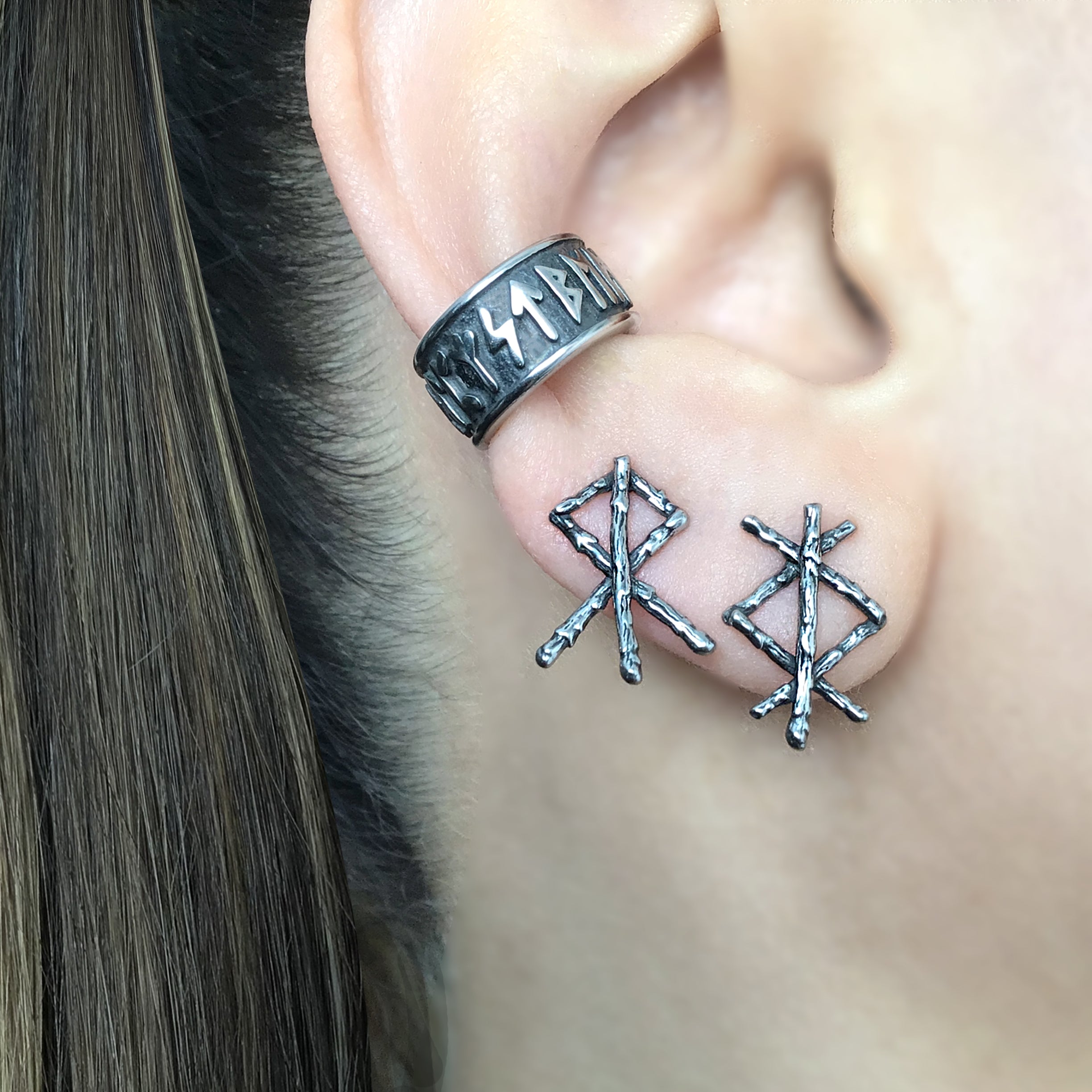 Mismatched Rune stud earrings in Black