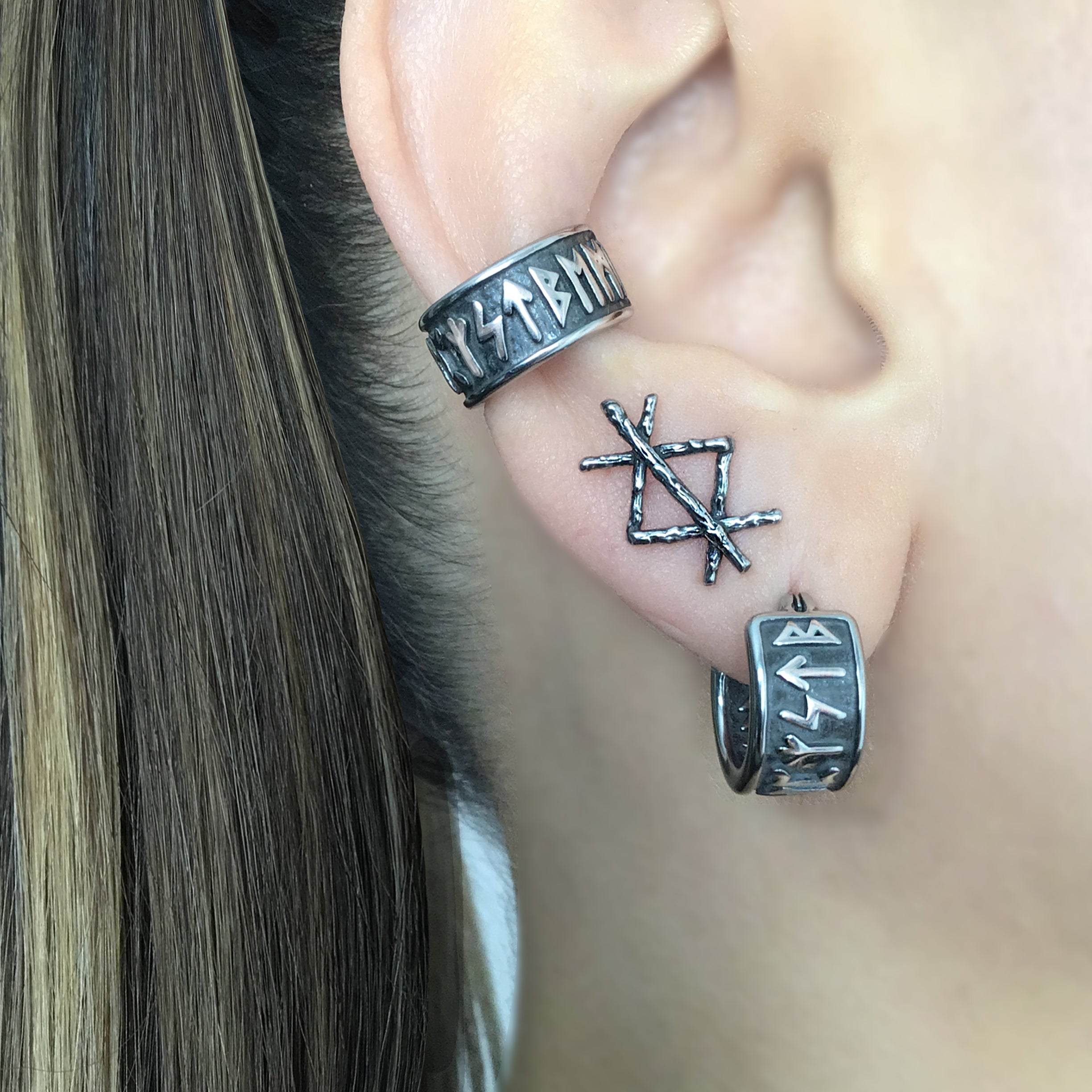 Mismatched Rune stud earrings in Black