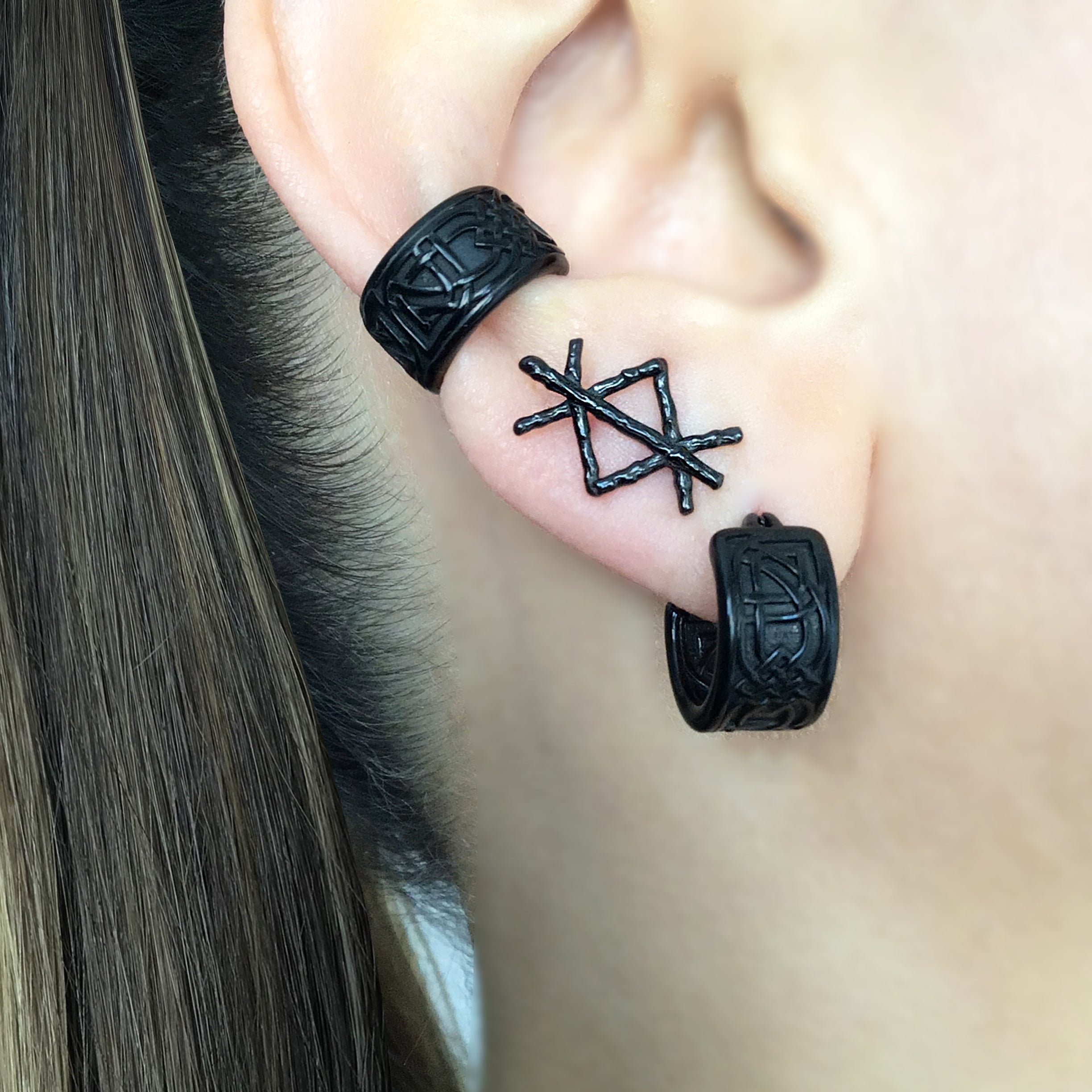 Mismatched Rune stud earrings in Black