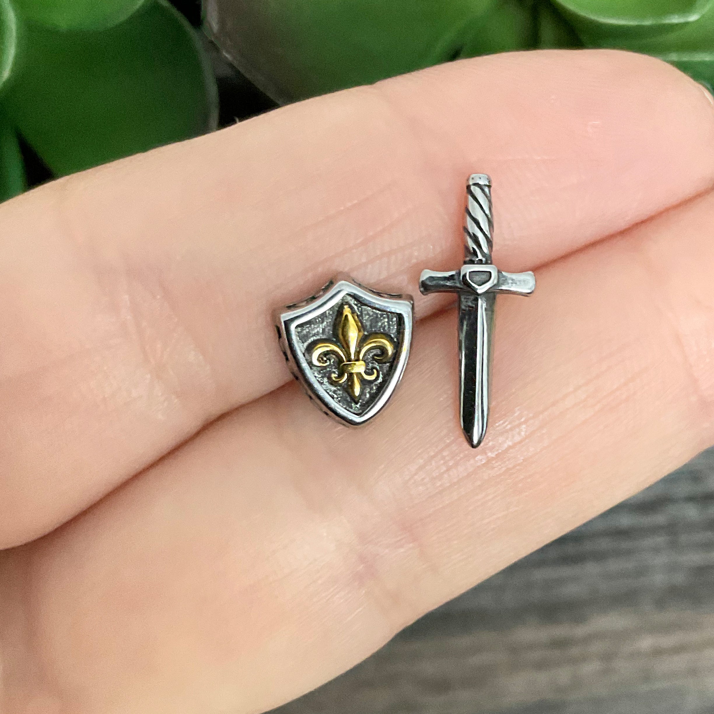 Sword and Shield stud earrings in Silver