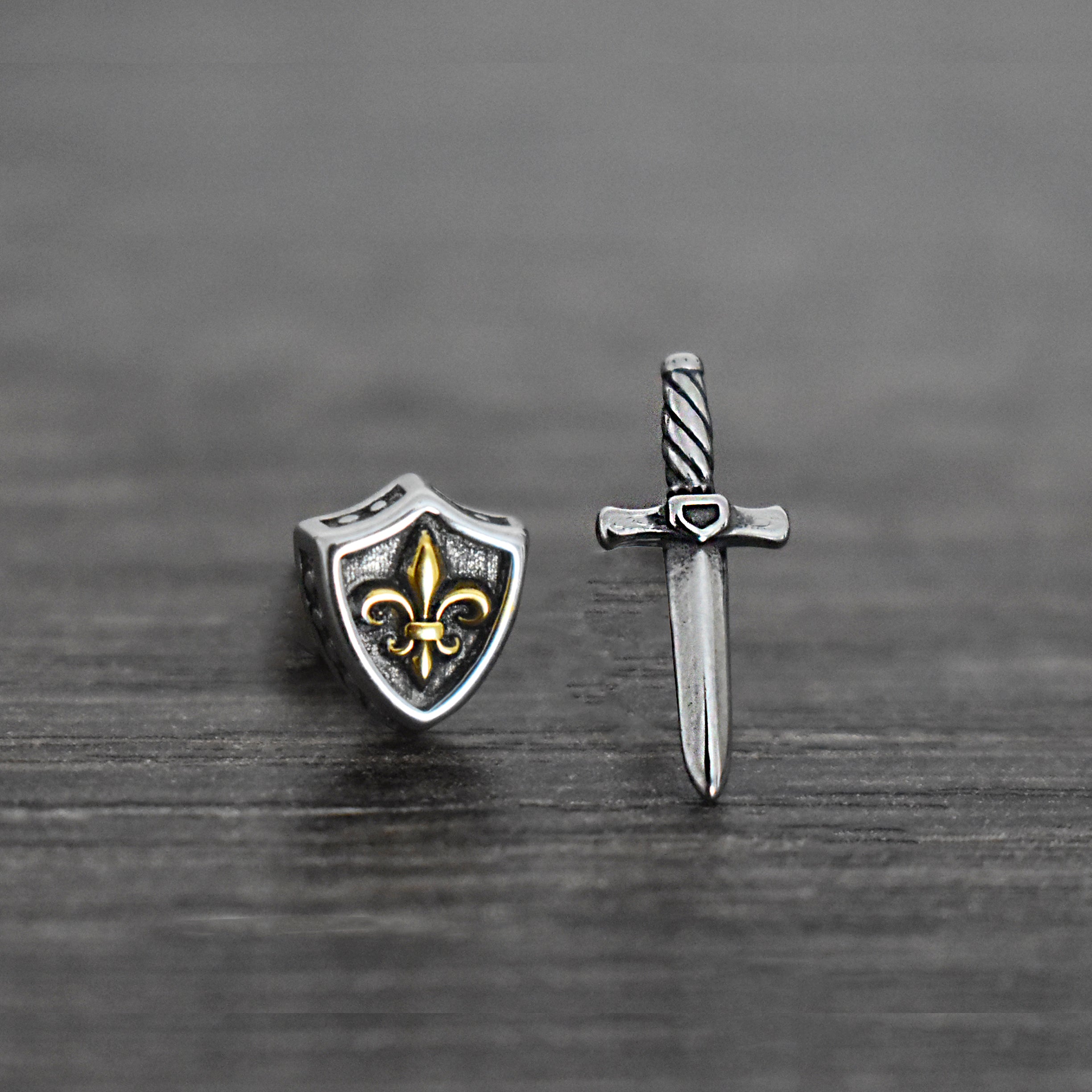 Sword and Shield stud earrings in Silver