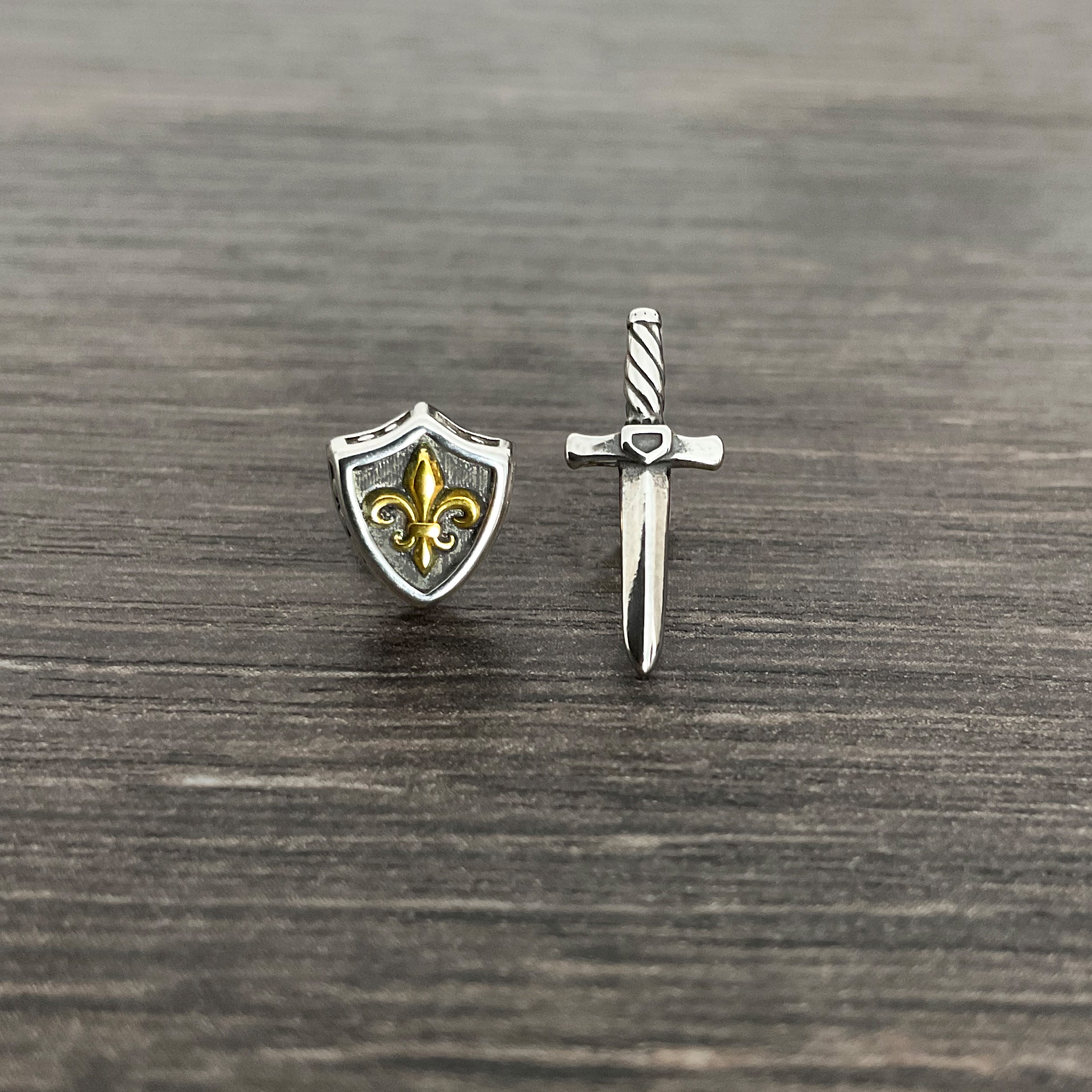 Sword and Shield stud earrings in Silver