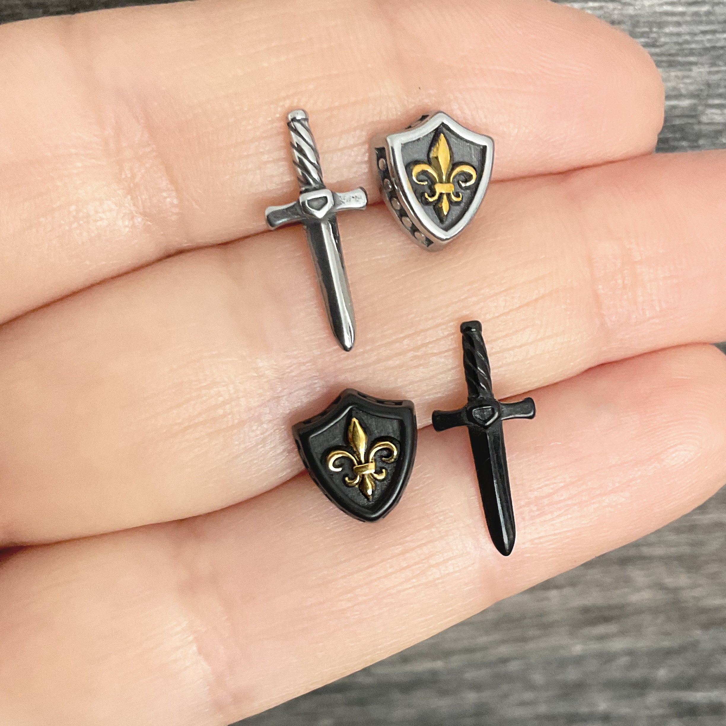 Sword and Shield stud earrings in Silver