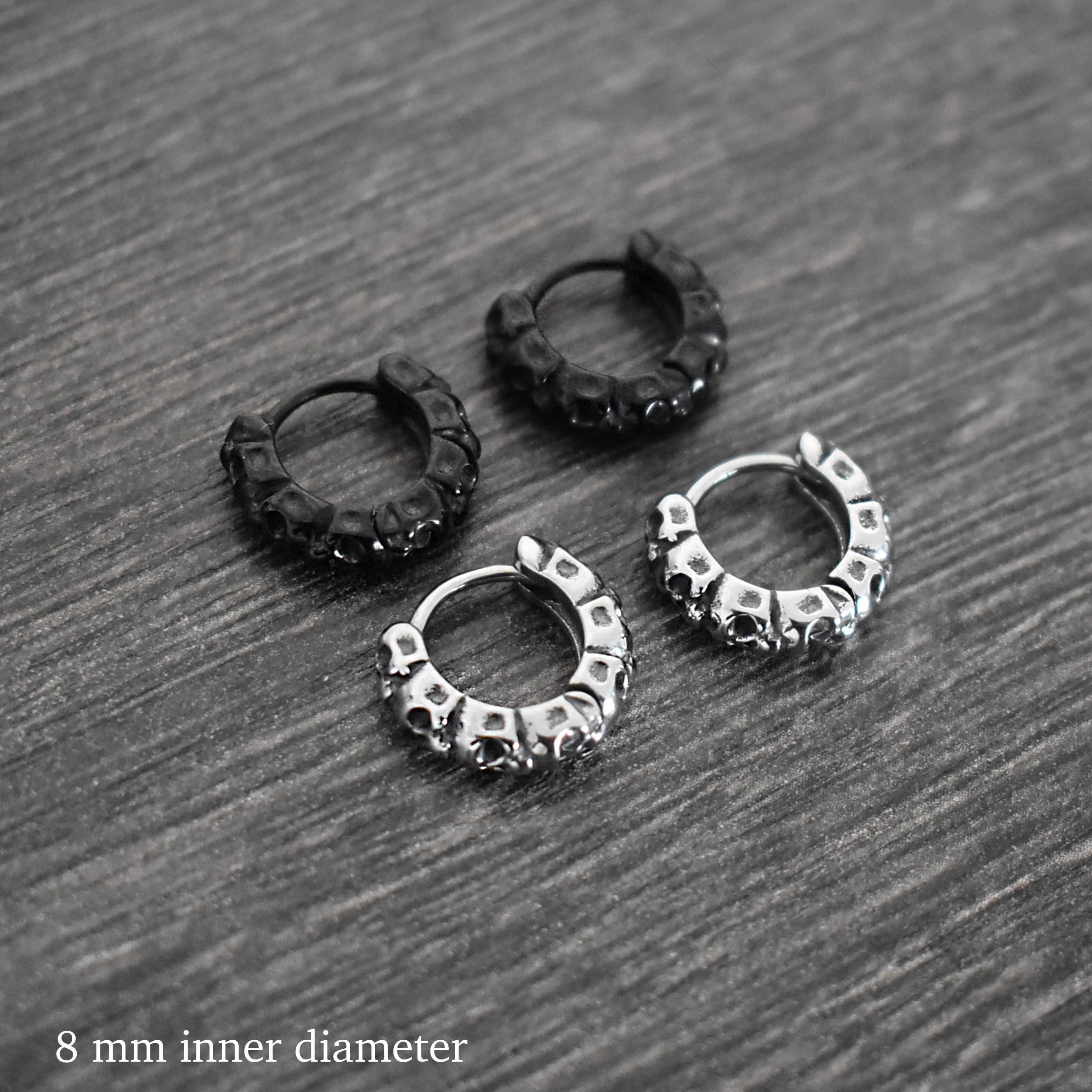 Skull huggie hoop earrings