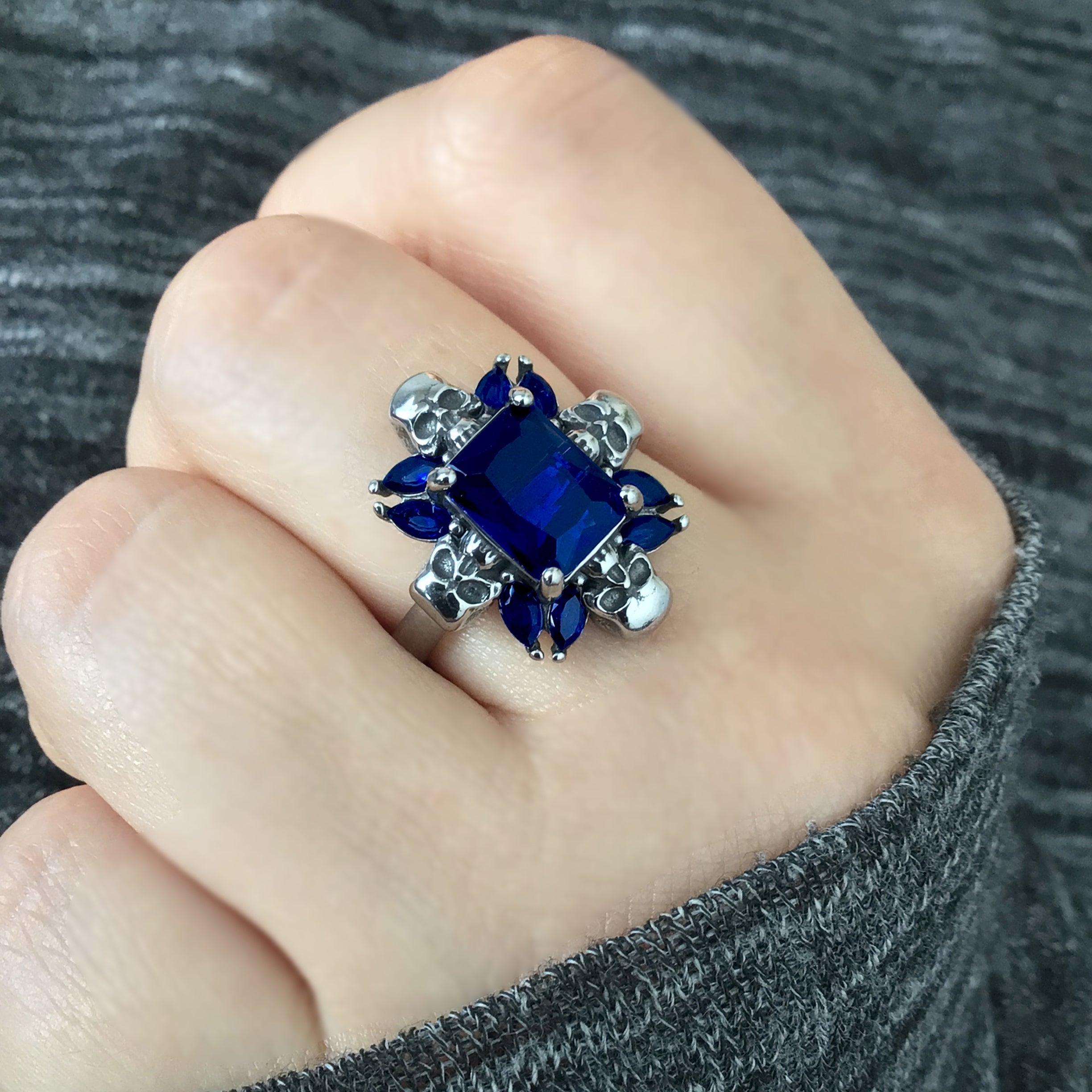 Renita ring with skulls and CZ stones in Blue