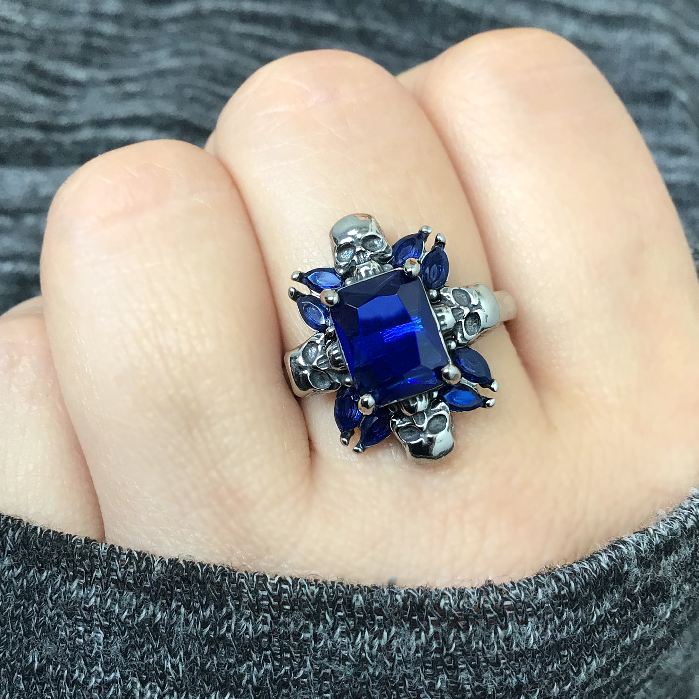 Renita ring with skulls and CZ stones in Blue