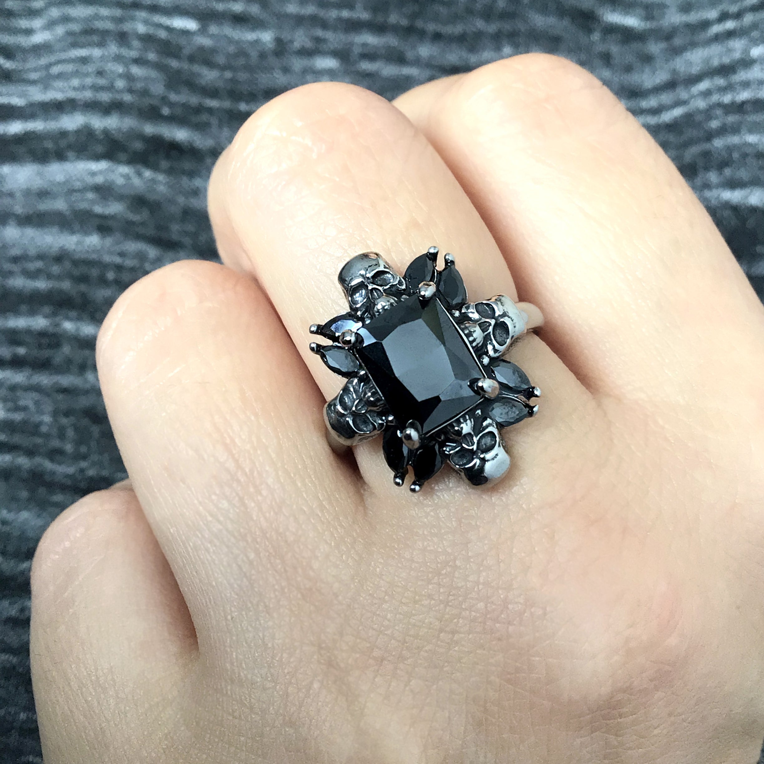 Renita ring with skulls and CZ stones in Blue