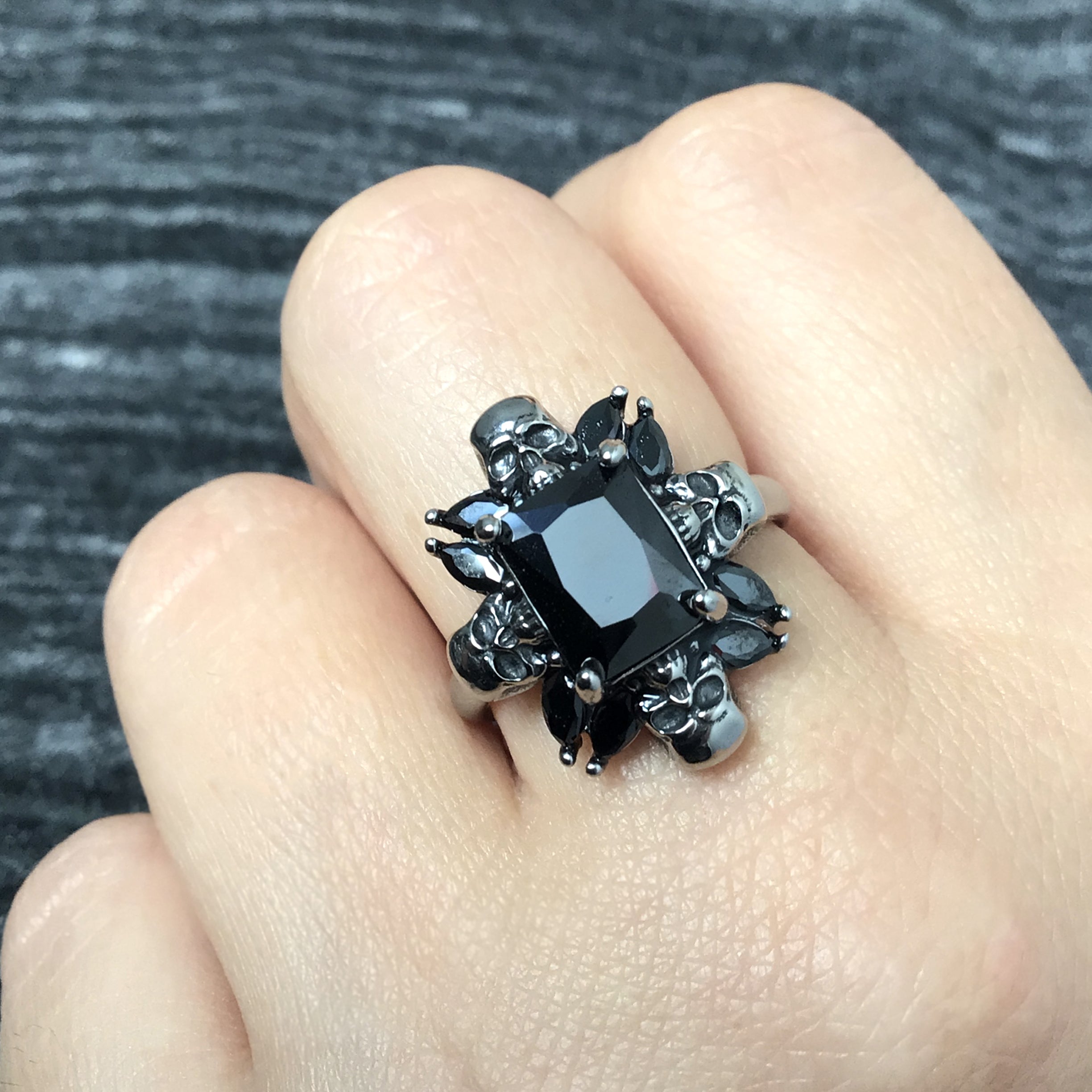 Renita ring with skulls and CZ stones in Black