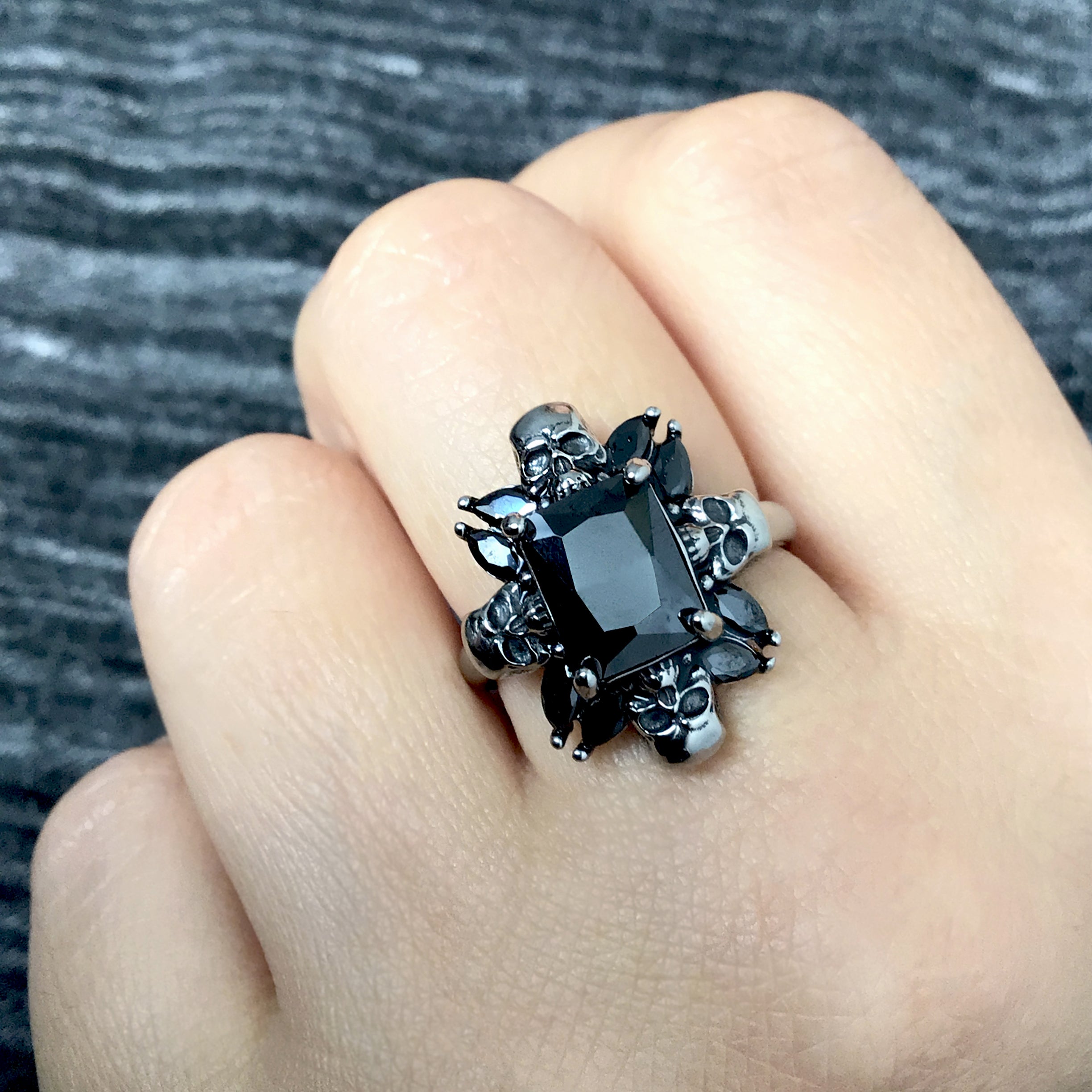 Renita ring with skulls and CZ stones in Blue