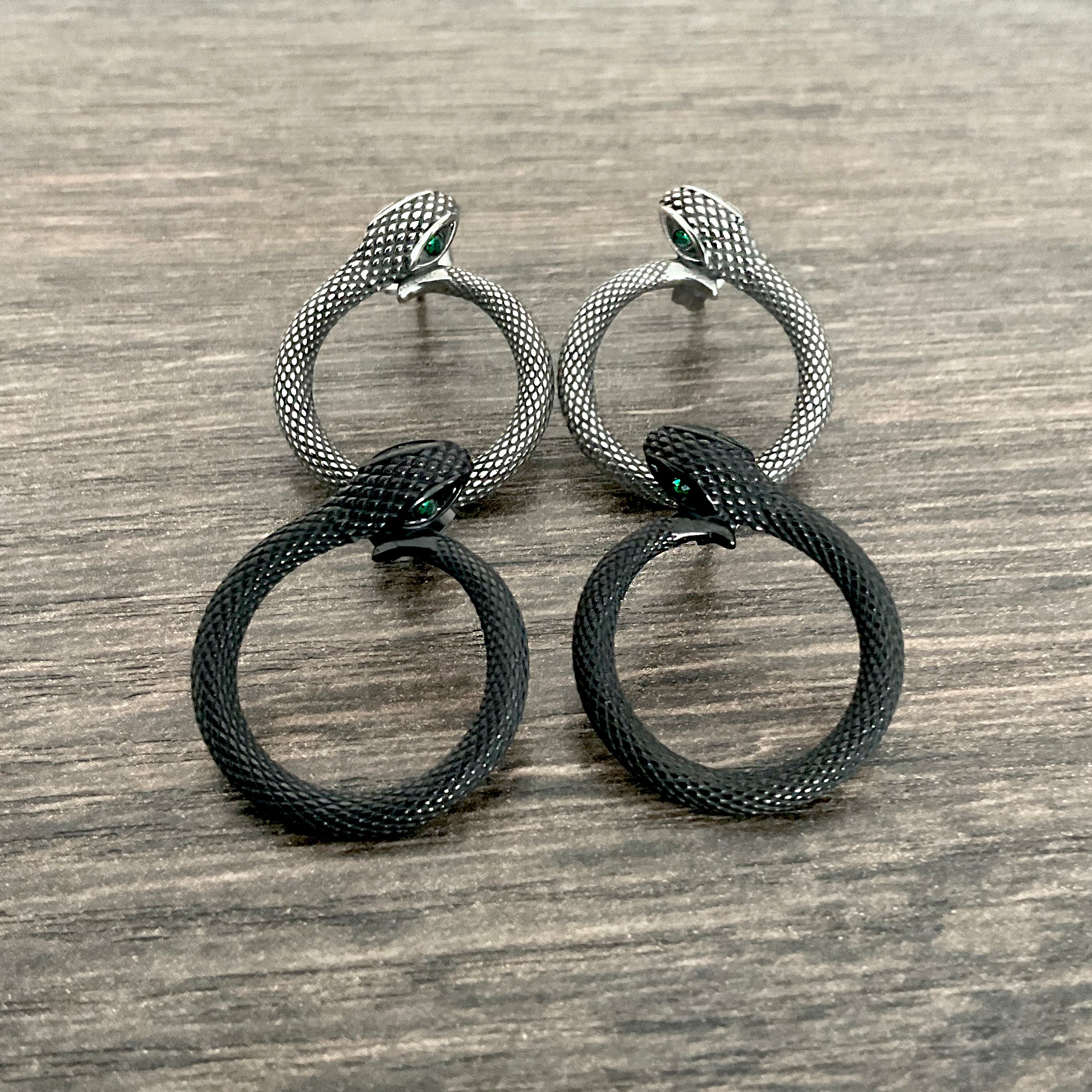 Snake stud earrings with Emerald CZ stones