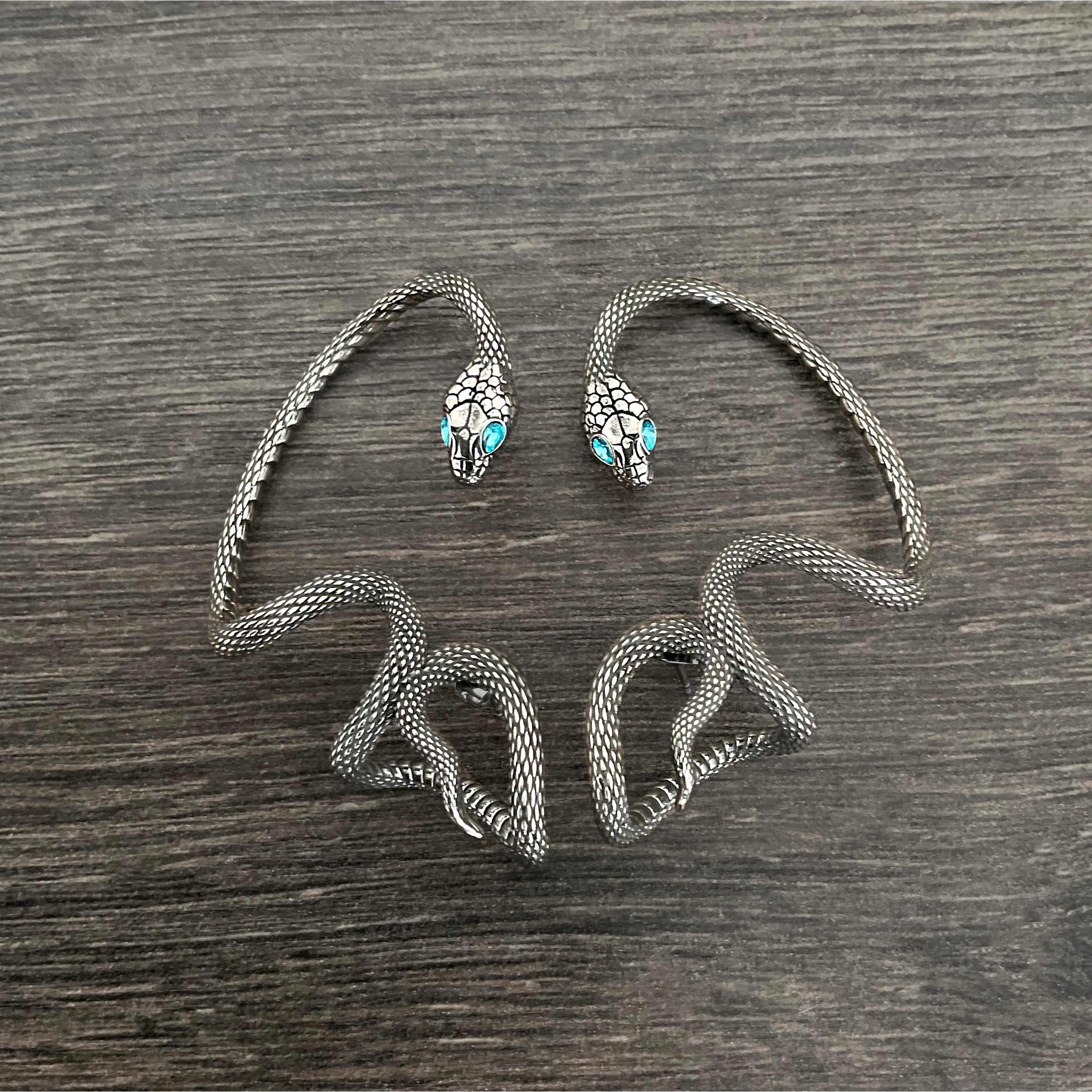 Snake ear wrap with Aquamarine Cz stones in Black