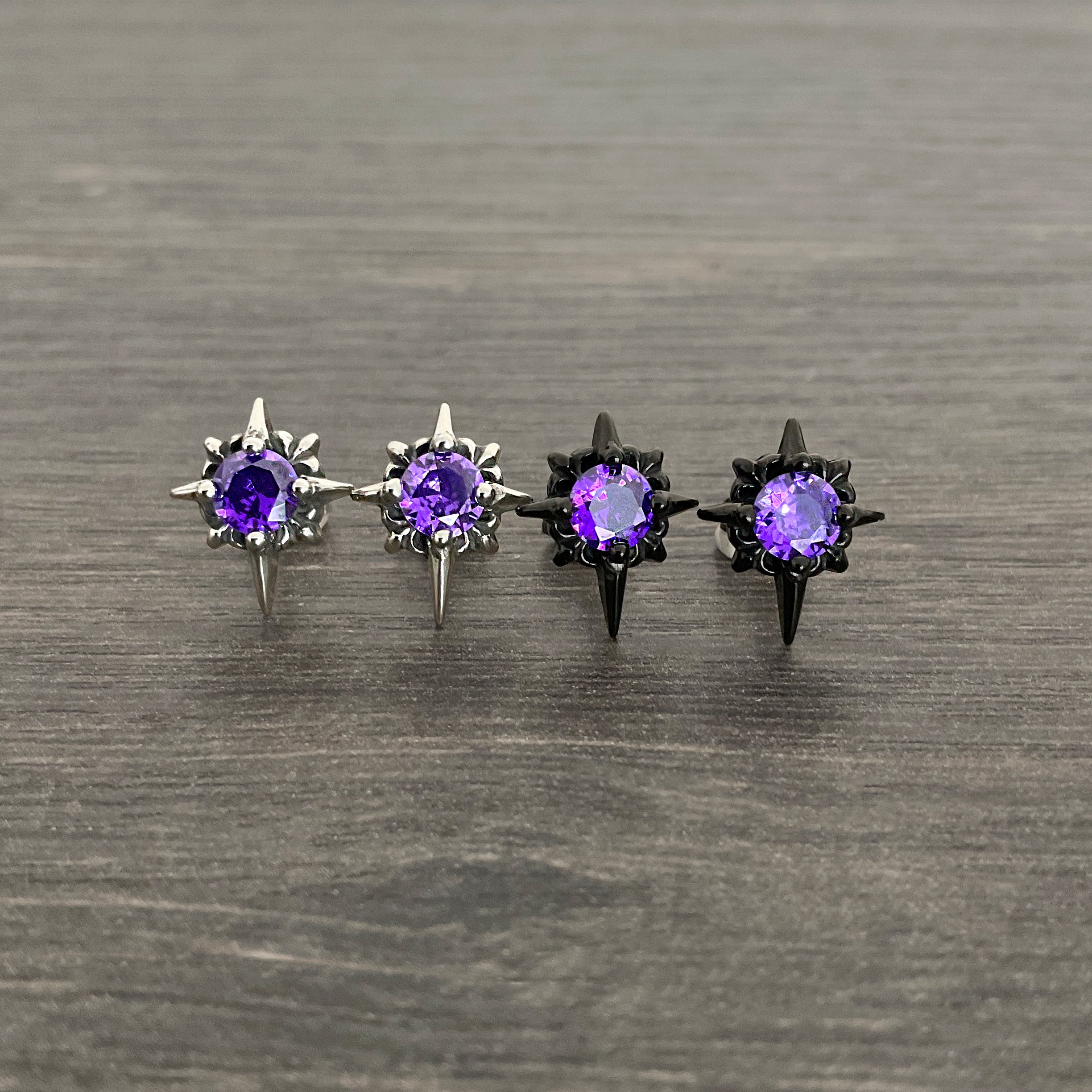 Starburst stud earrings with Purple CZ