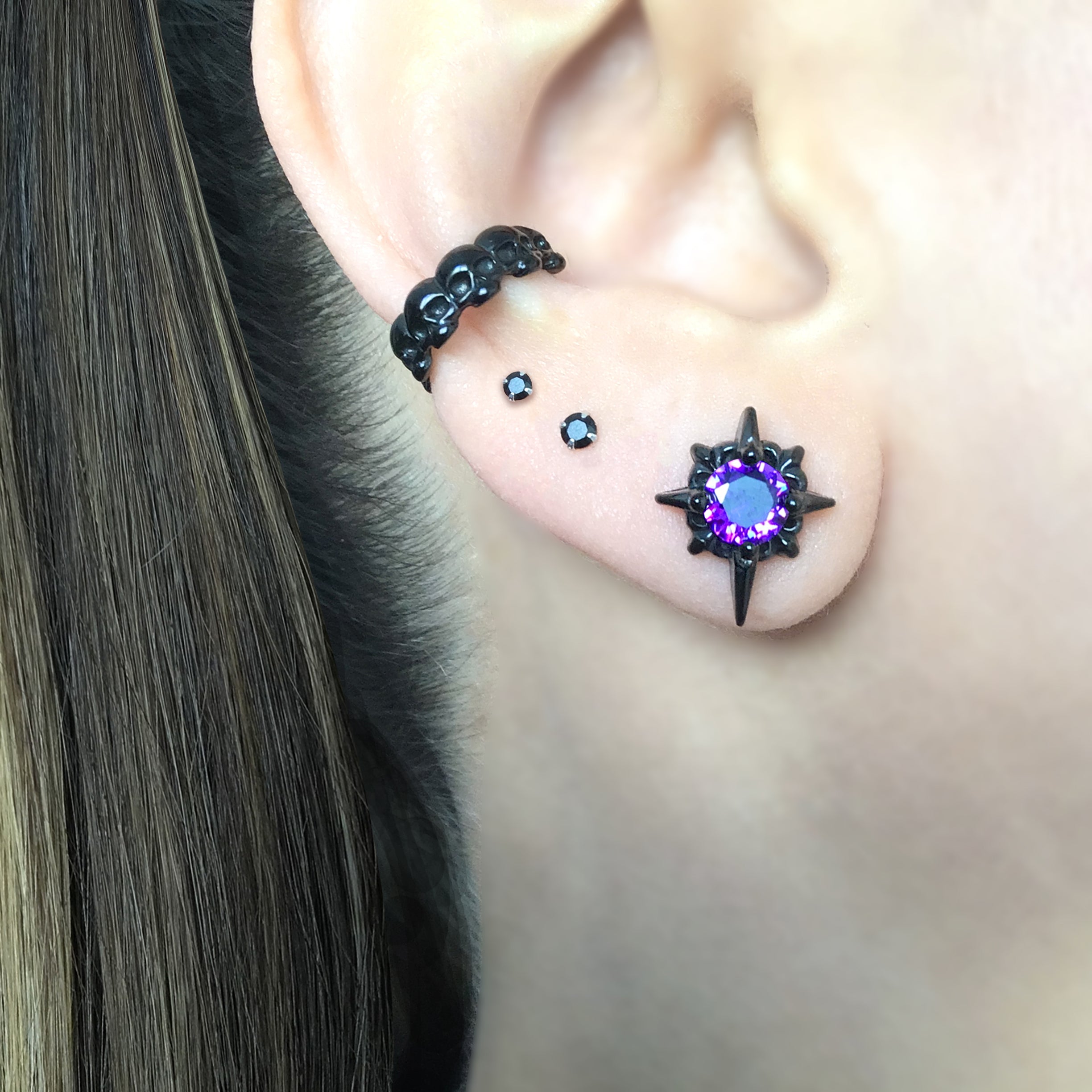 Starburst stud earrings with Purple CZ