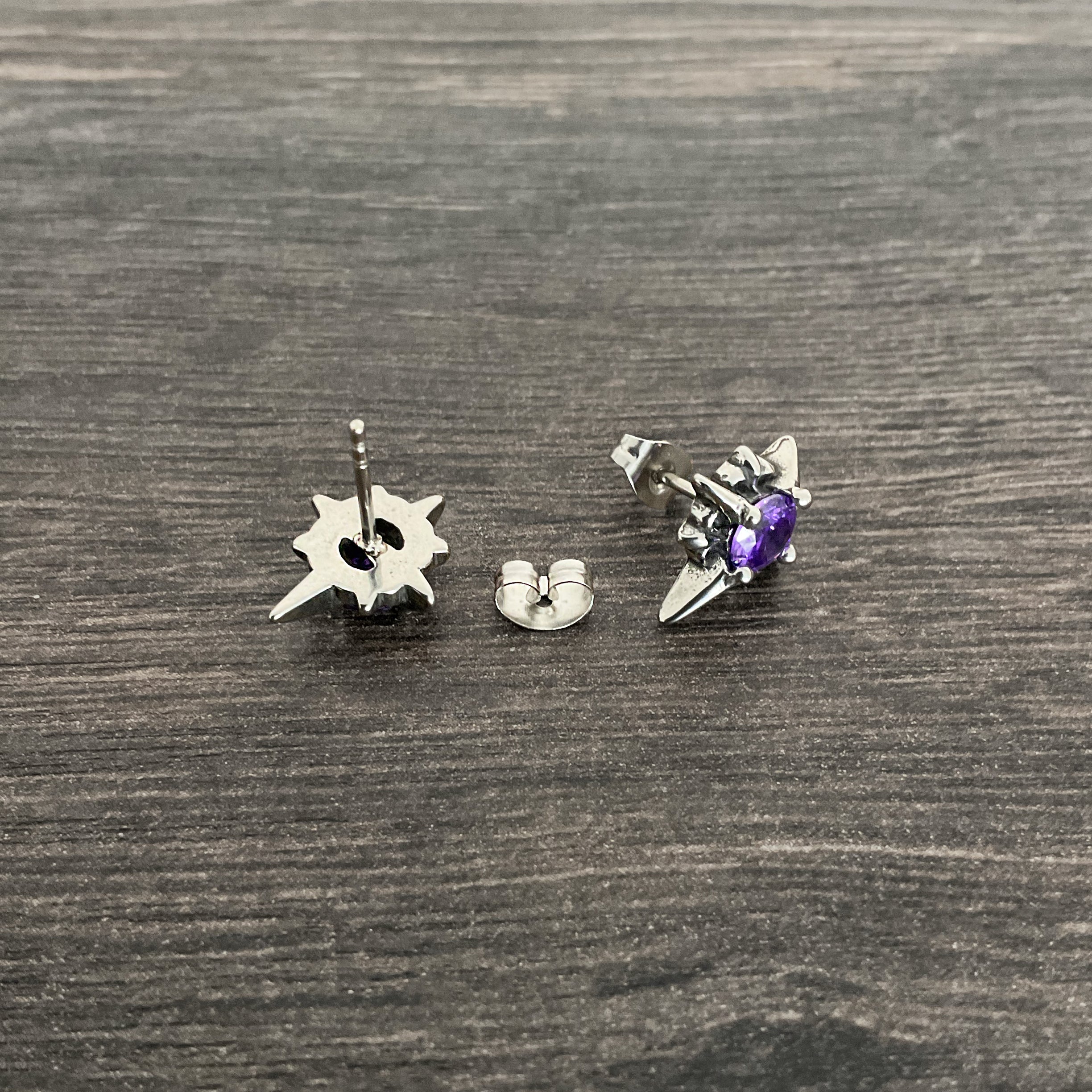 Starburst stud earrings with Purple CZ