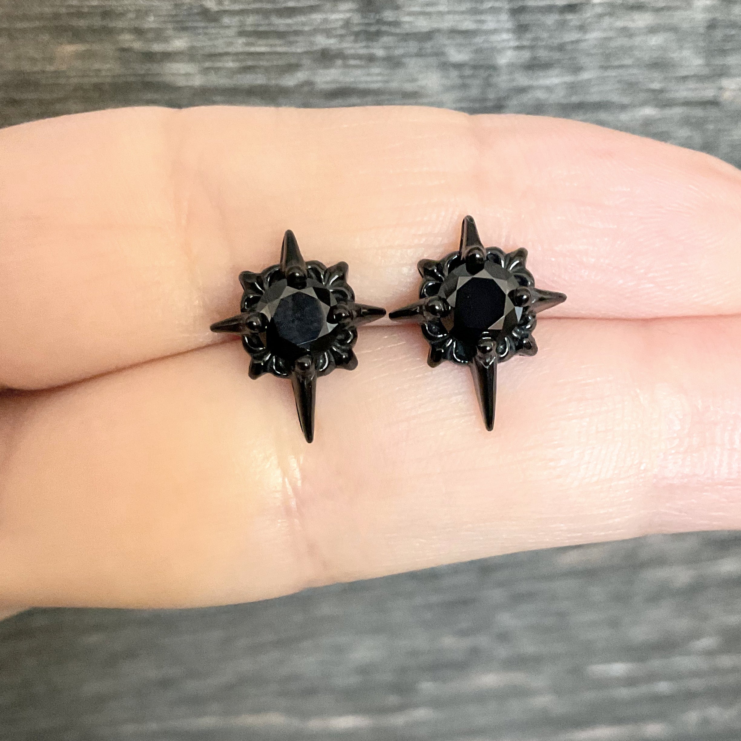 Black Starburst stud earrings with Black CZ