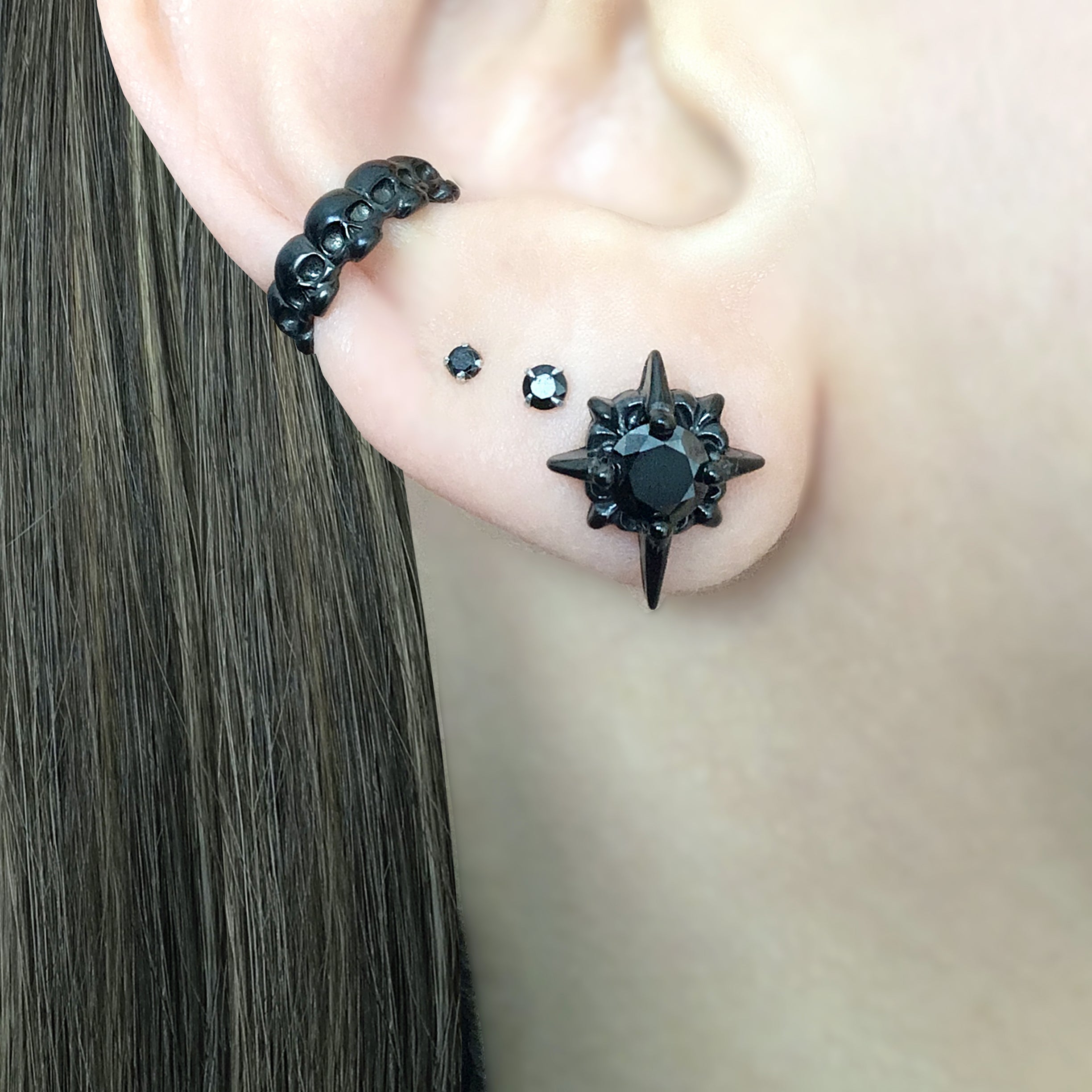 Black Starburst stud earrings with Black CZ