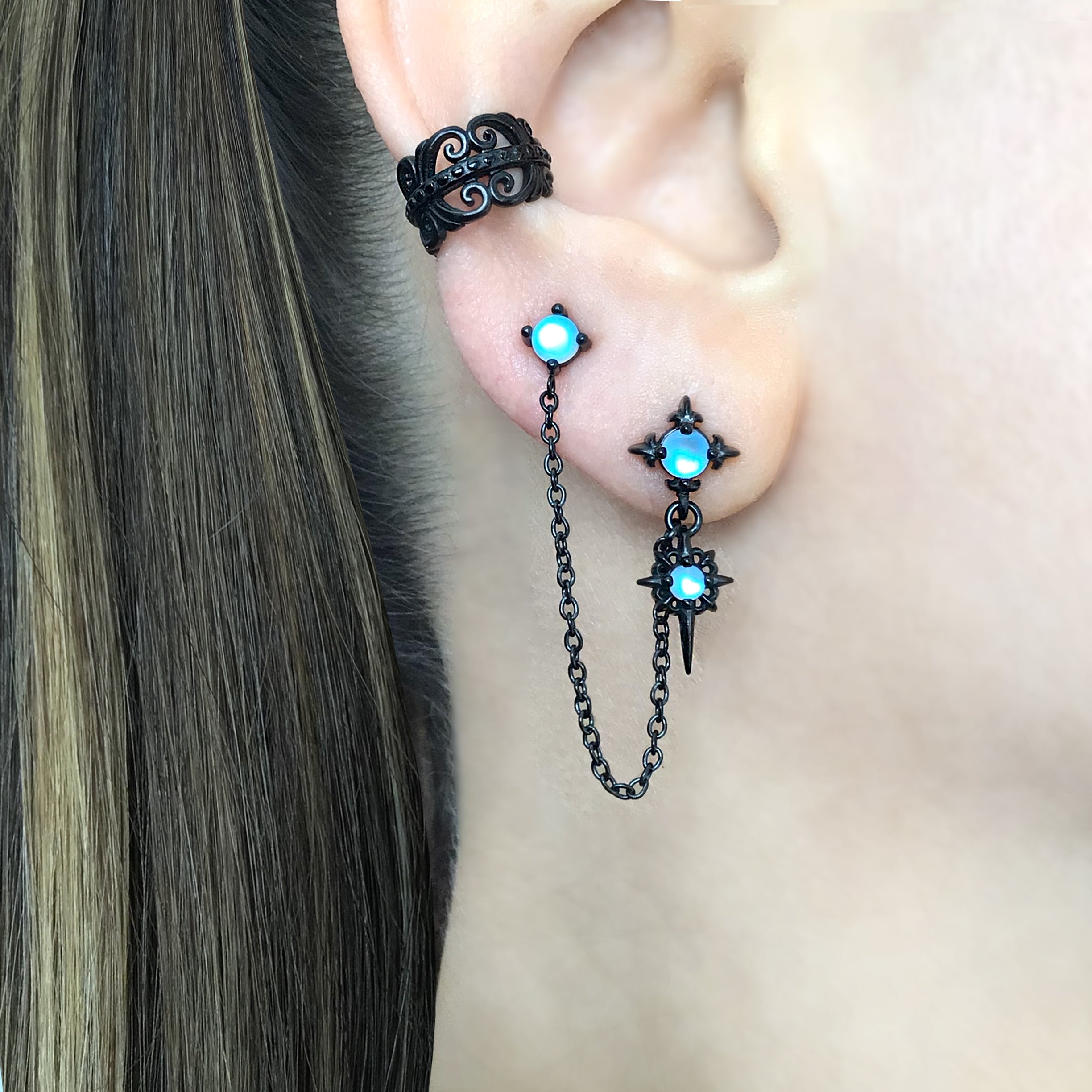 Double piercing Gothic Star earring with Blue glass