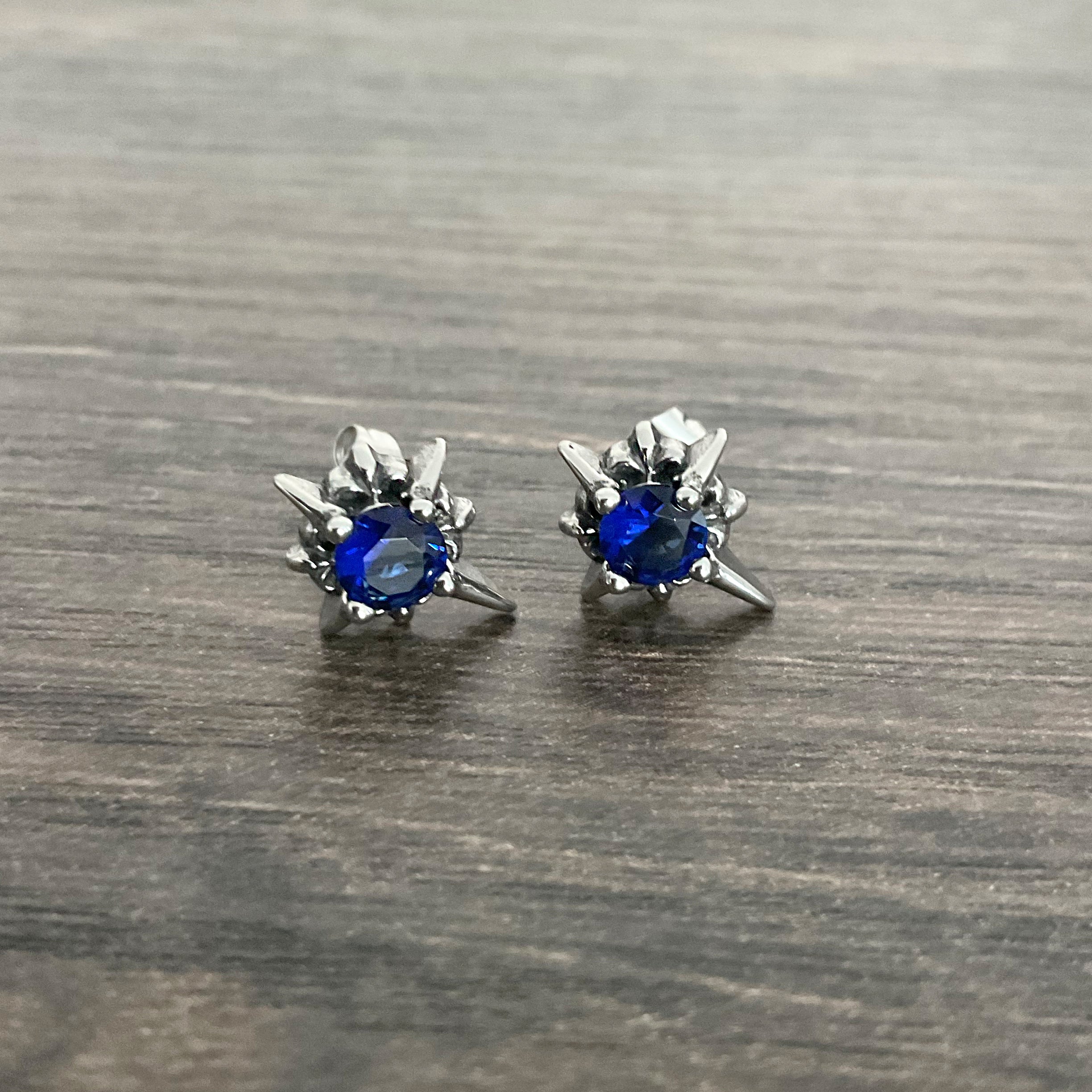 Starburst stud earrings with Sapphire blue CZ