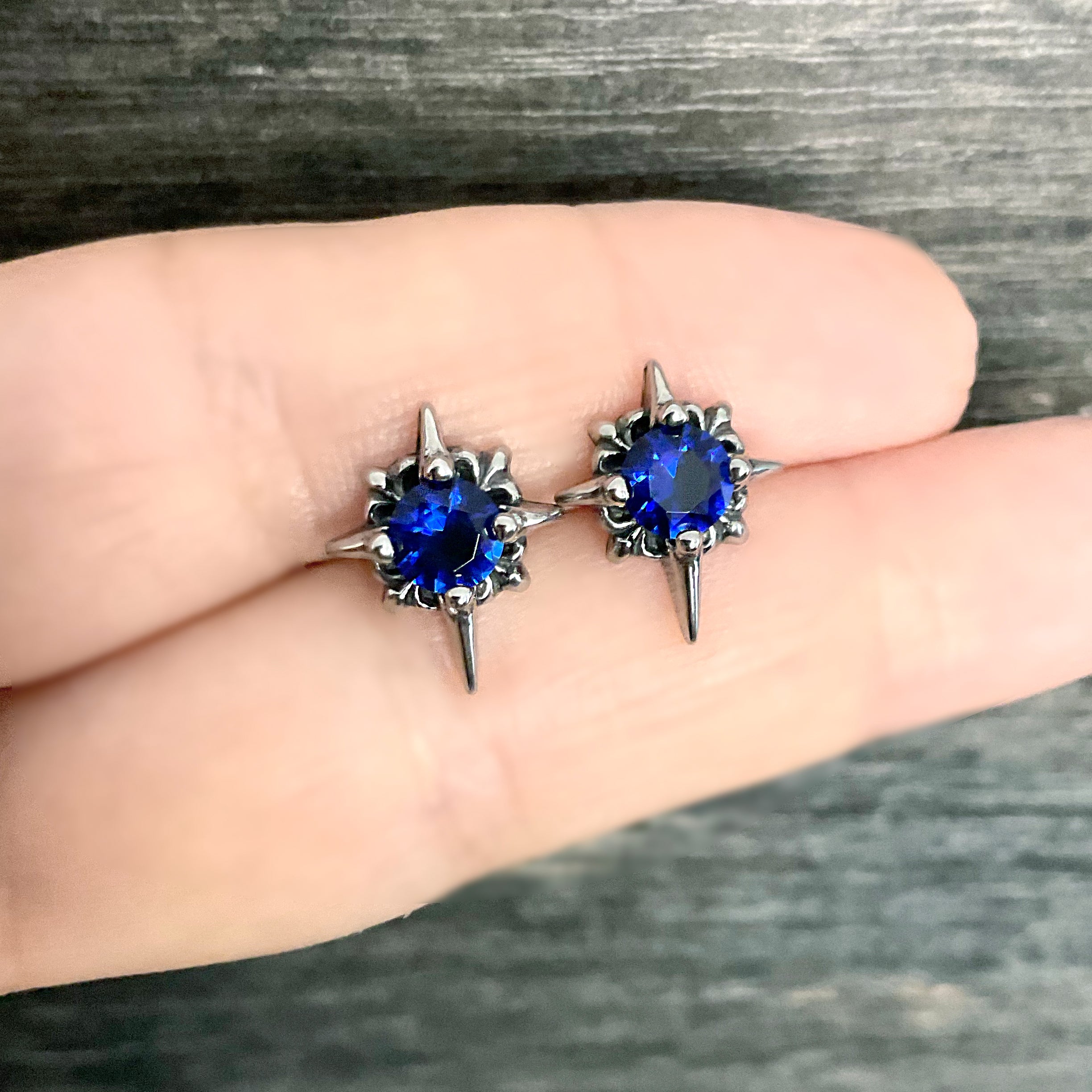 Starburst stud earrings with Sapphire blue CZ