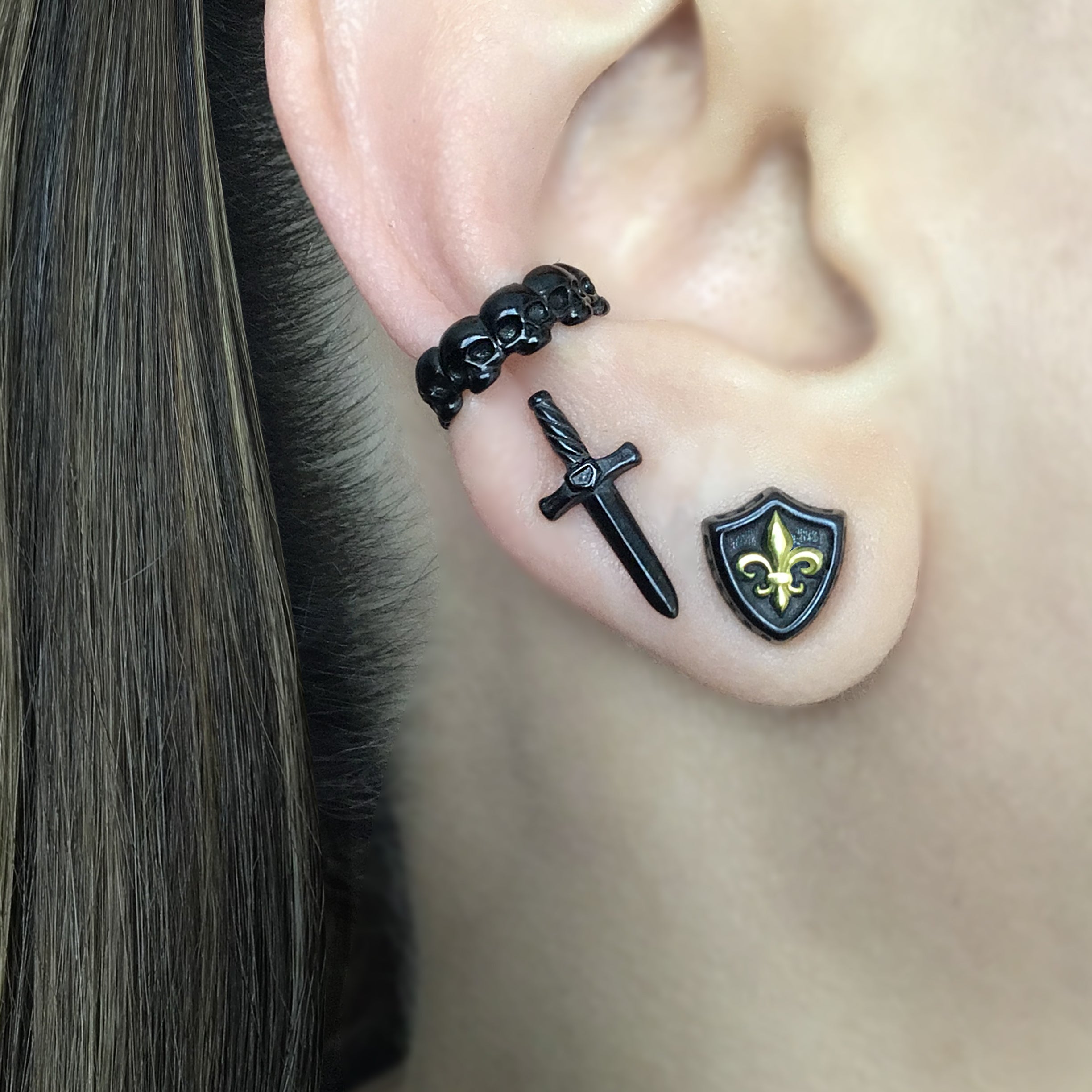 Sword and Shield stud earrings in Black