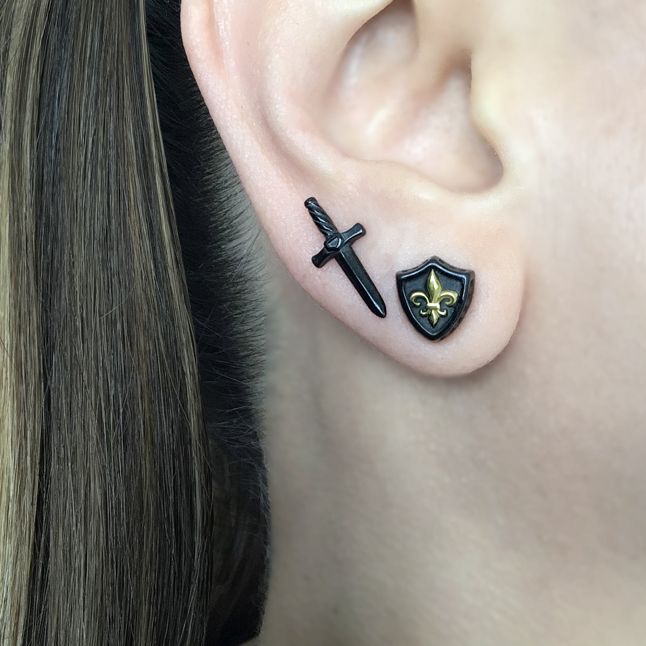 Sword and Shield stud earrings in Black