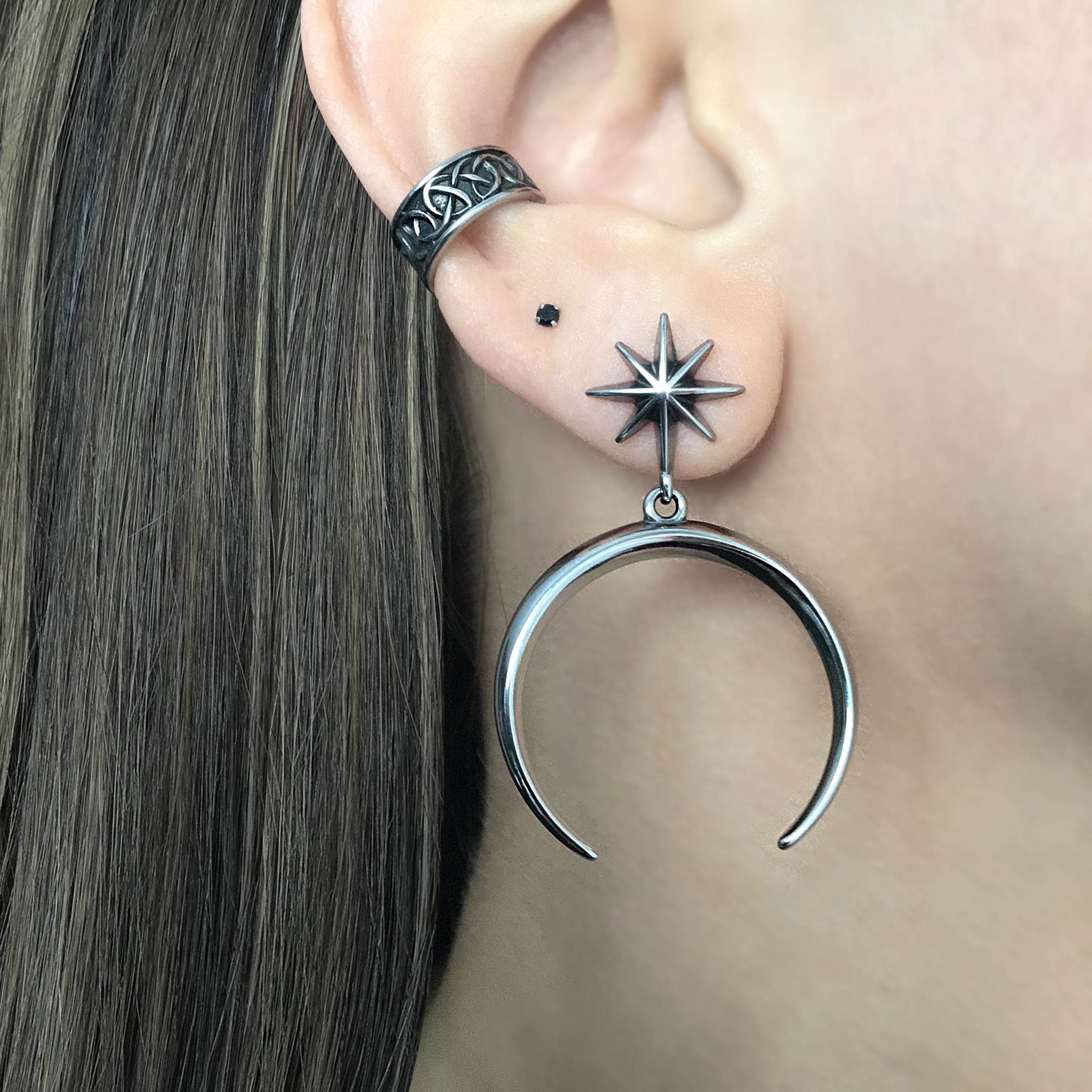 Star and moon stud earrings in Black