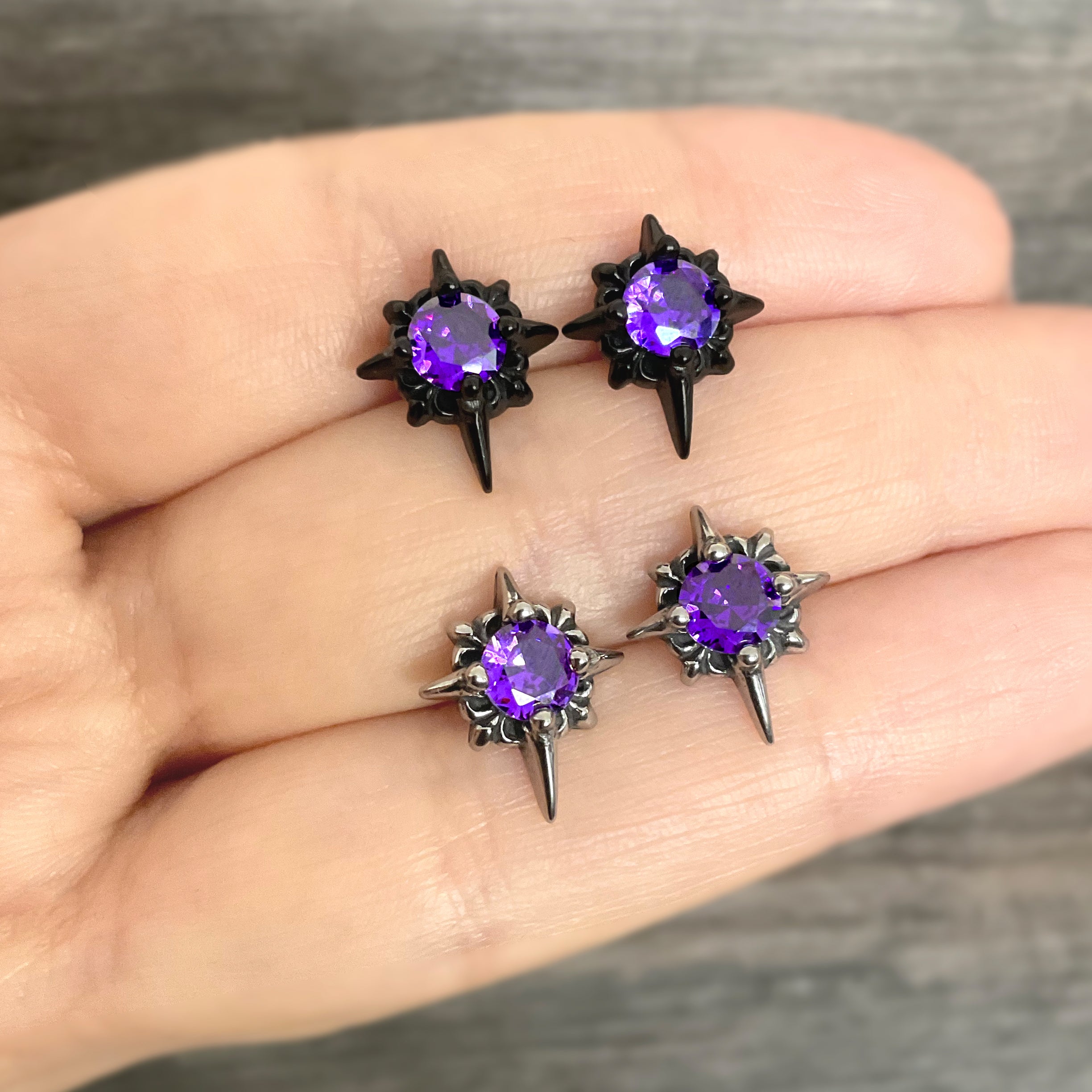 Starburst stud earrings with Purple CZ